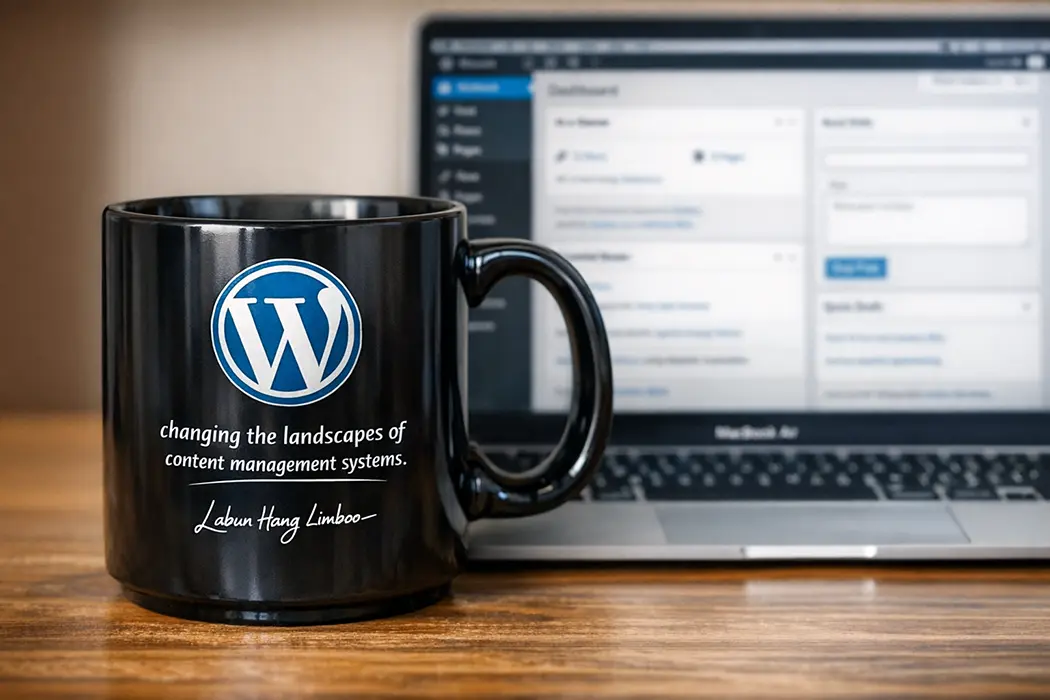 Black coffee mug with the WordPress logo in front of a laptop showing the WordPress dashboard